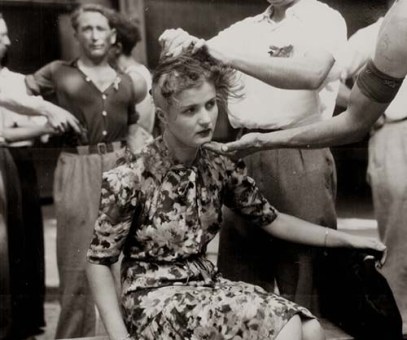 A-French-woman-has-her-head-shaved-by-civilians-as-a-penalty-for-having-consorted-with-German-troops-1944